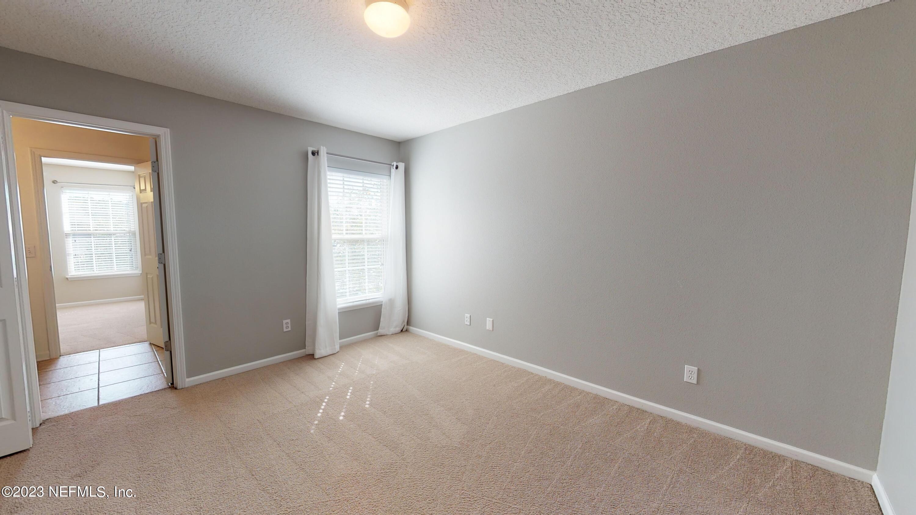 168 Leese Drive St. Johns, FL 32259 - Photo 15 of 25 a view of an empty room with a window