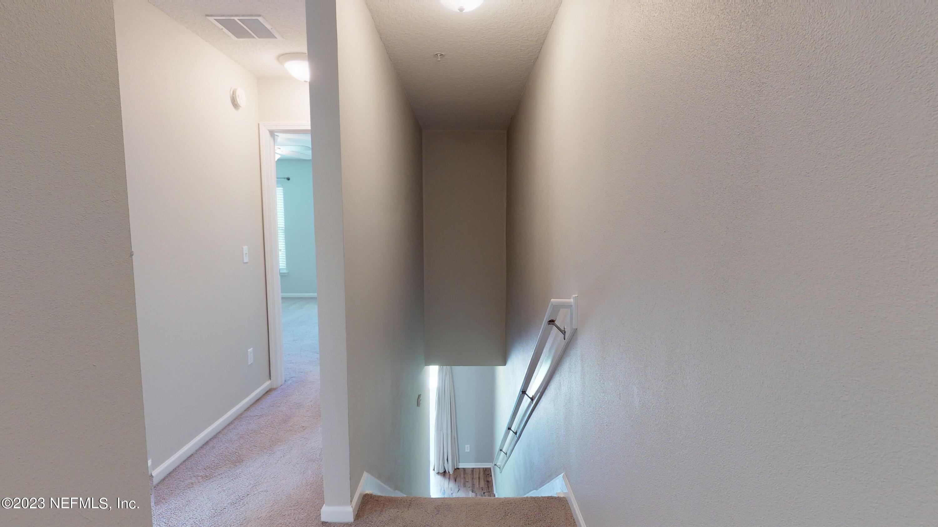 168 Leese Drive St. Johns, FL 32259 - Photo 18 of 25 a view of a hallway with windows
