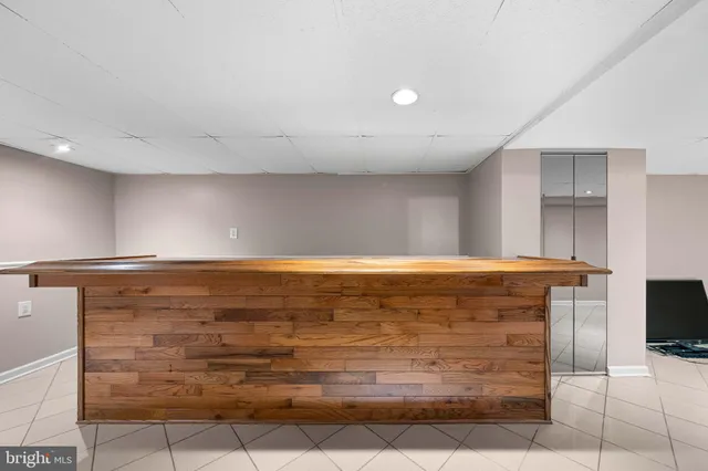 a view of a hallway with seating area