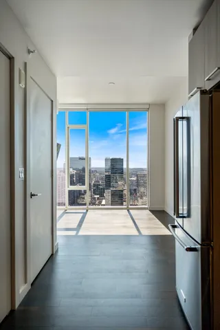a view of a living room filled with furniture
