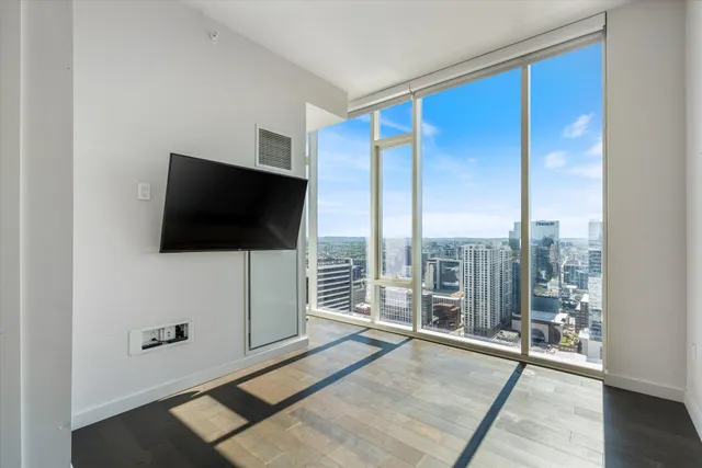 a view of a livingroom with furniture and windows