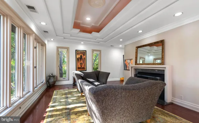 a view of a patio with couches chairs and a potted plant