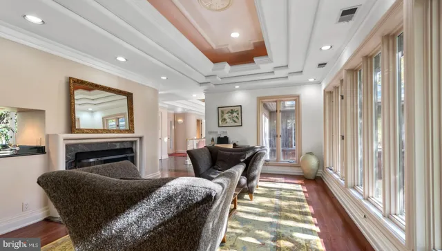 a backyard of a house with outdoor seating