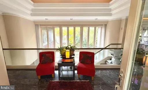 a living room with furniture fireplace and flat screen tv