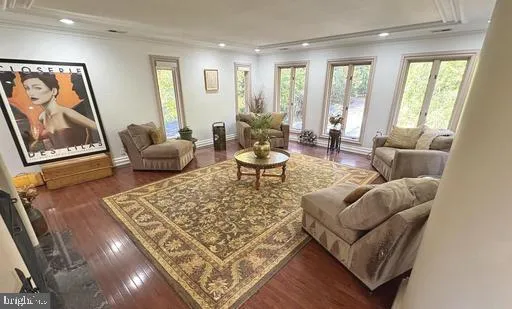 a living room with furniture and a rug