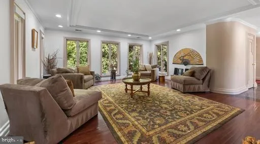 a living room with furniture and a rug