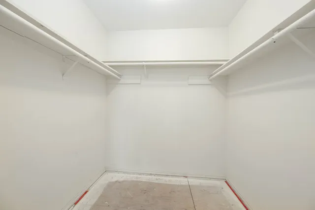 a view of an empty walk in closet