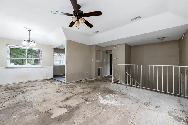 a view of an empty room and window