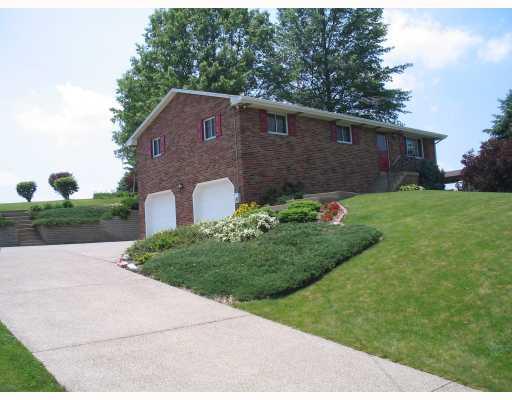 233 Vaneal Road Washington, PA 15301 - Photo 1 of 8 Exterior Front. Agregate cement drive just re-seal and some new retaining walls. Immaculate Home! Great curb appeal.