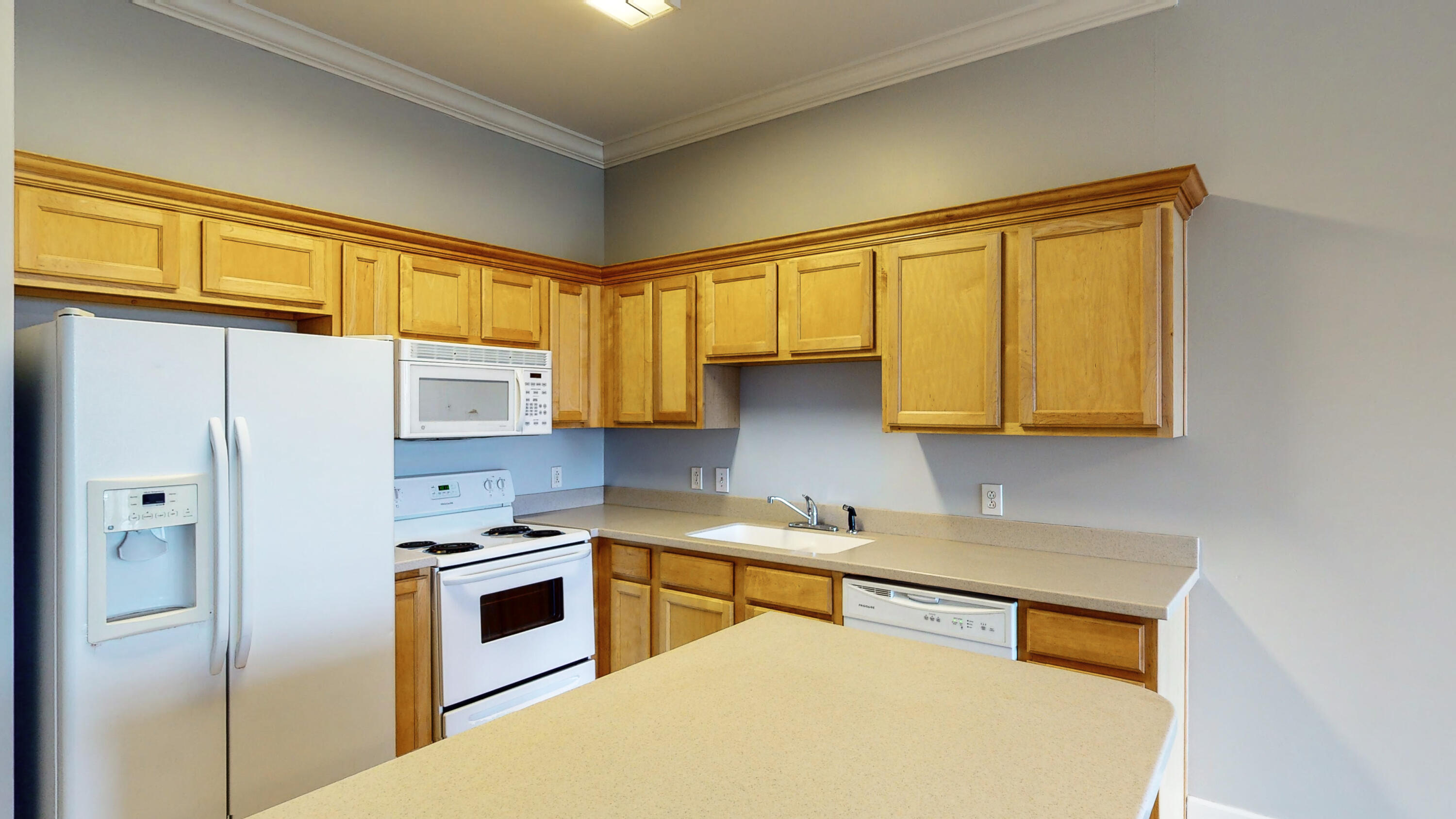231 Somerset Bridge Road, Unit 1408 Santa Rosa Beach, FL 32459 - Photo 11 of 25 a kitchen with stainless steel appliances a refrigerator sink and cabinets