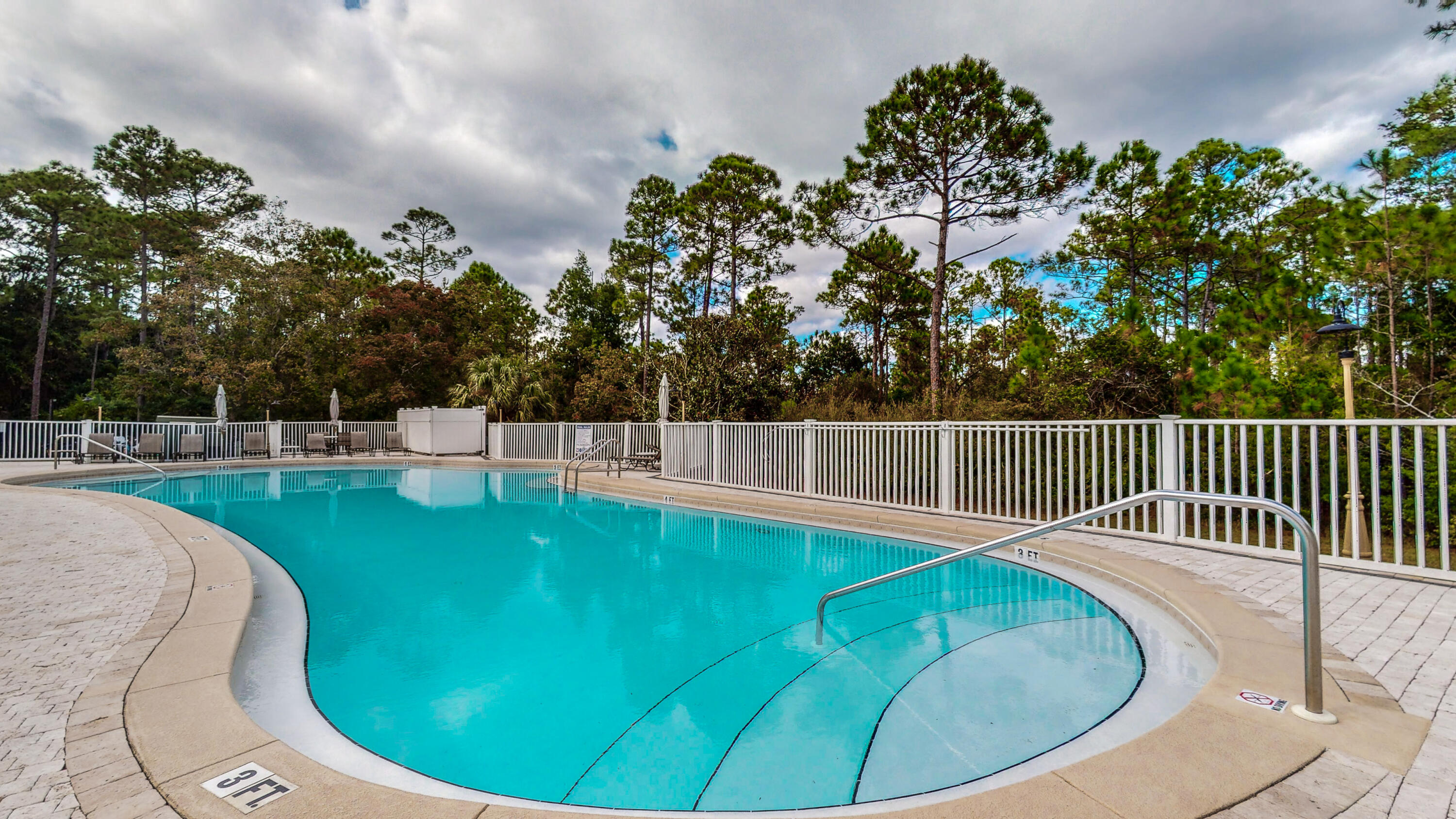 231 Somerset Bridge Road, Unit 1408 Santa Rosa Beach, FL 32459 - Photo 4 of 25 a view of a swimming pool with a porch