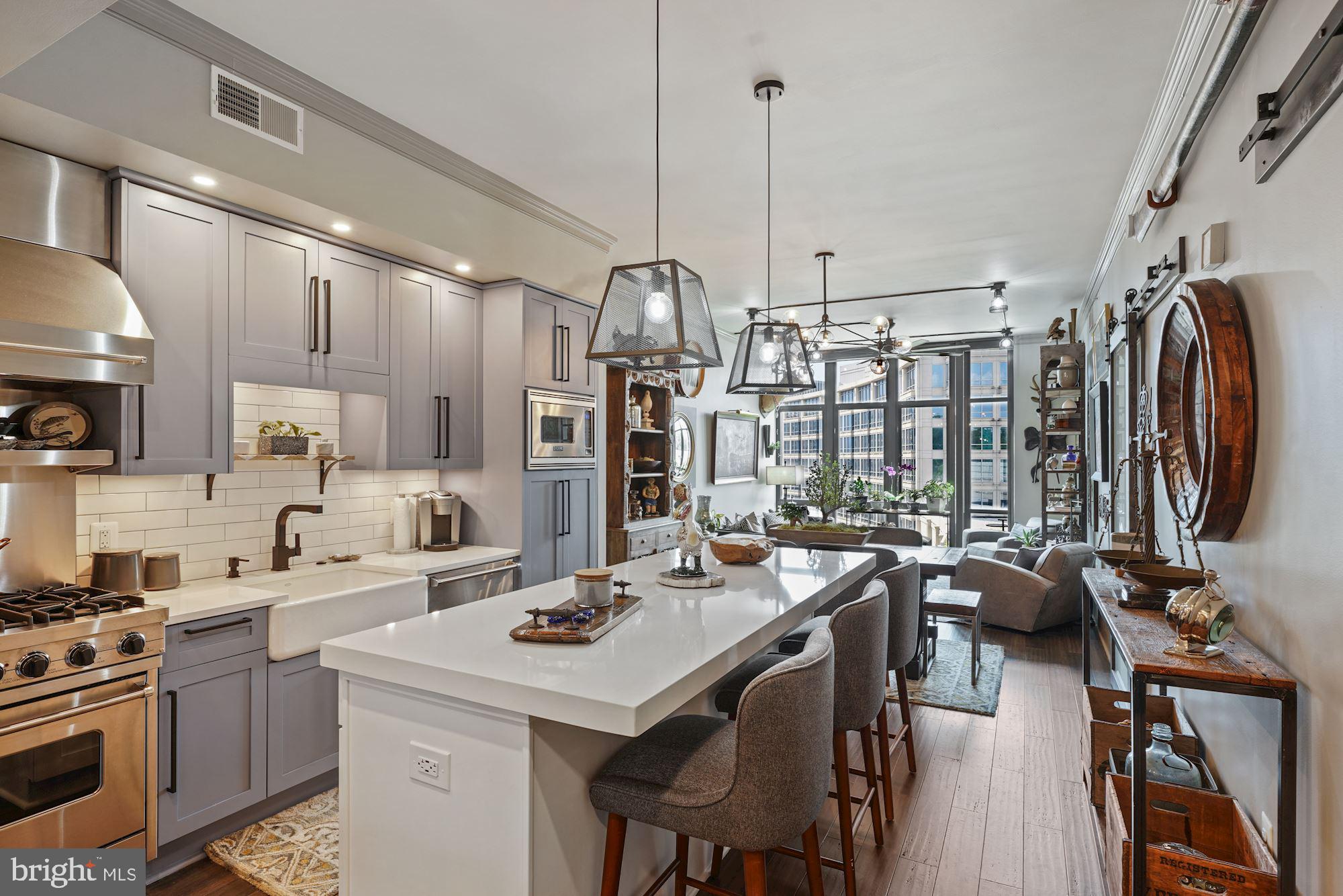 4301 Military Road Northwest, Unit 611 Washington, DC 20015 - Photo 11 of 45 Kitchen looking into dining and living space