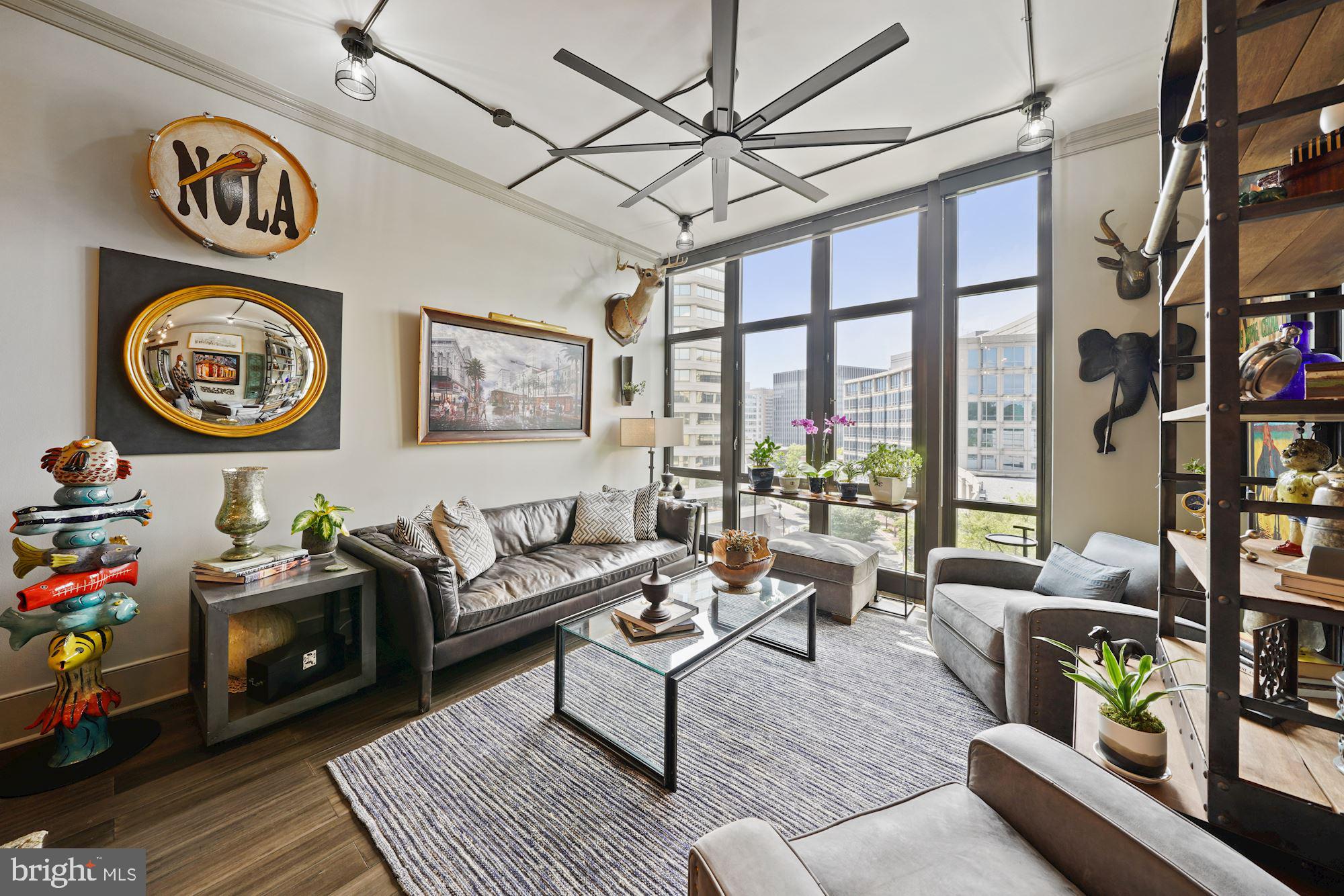 4301 Military Road Northwest, Unit 611 Washington, DC 20015 - Photo 17 of 45 Living Room with wall of floor to ceiling windows