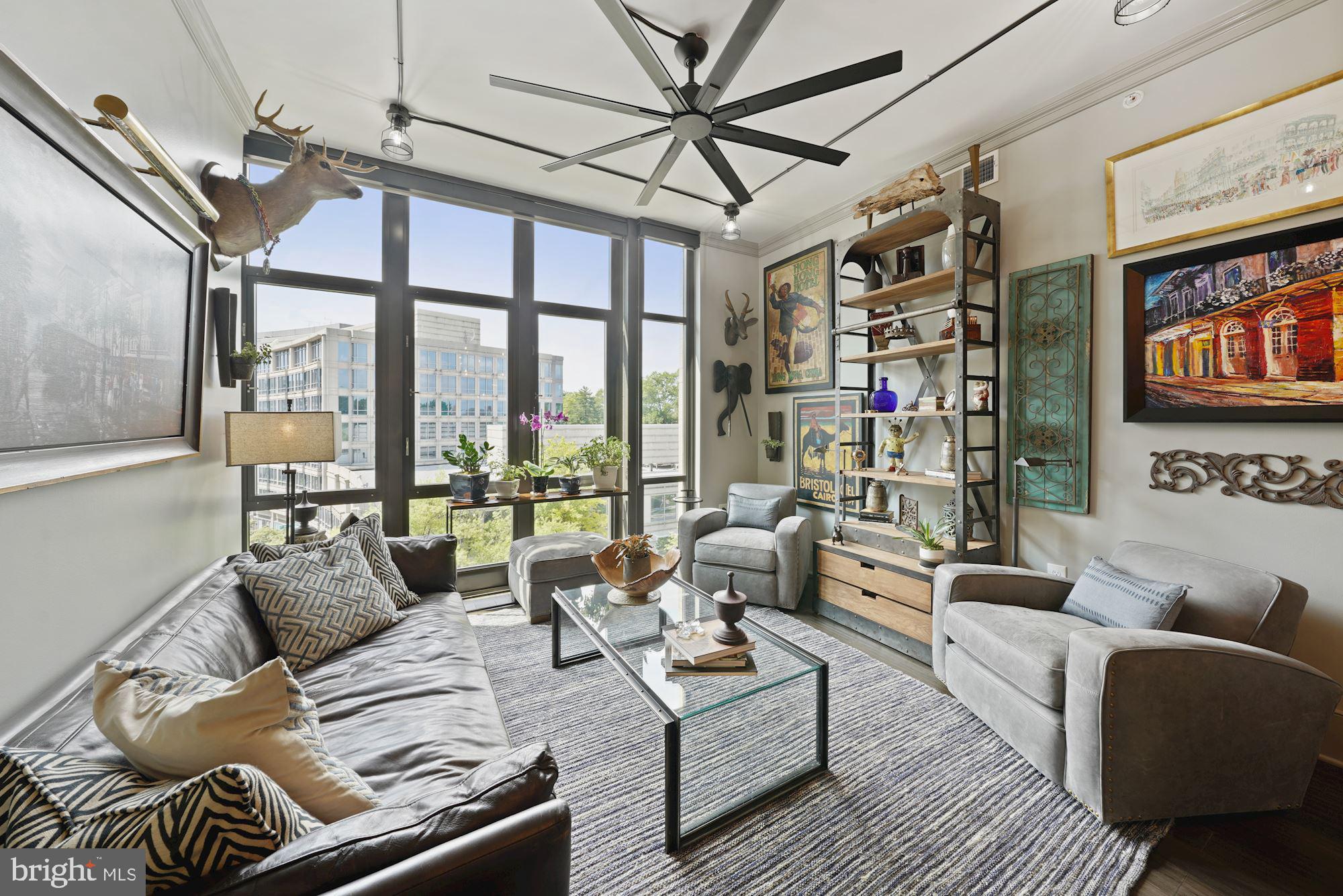 4301 Military Road Northwest, Unit 611 Washington, DC 20015 - Photo 20 of 45 Living Room with wall of floor to ceiling windows