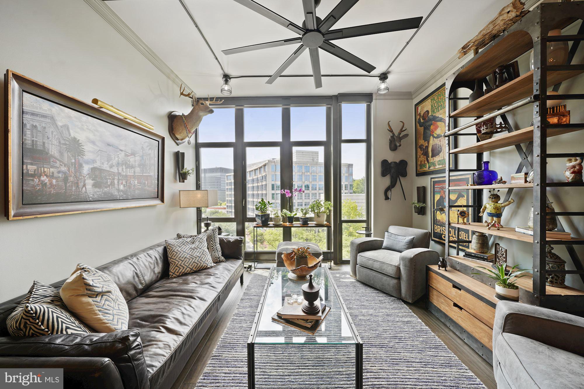 4301 Military Road Northwest, Unit 611 Washington, DC 20015 - Photo 21 of 45 Living Room with wall of floor to ceiling windows