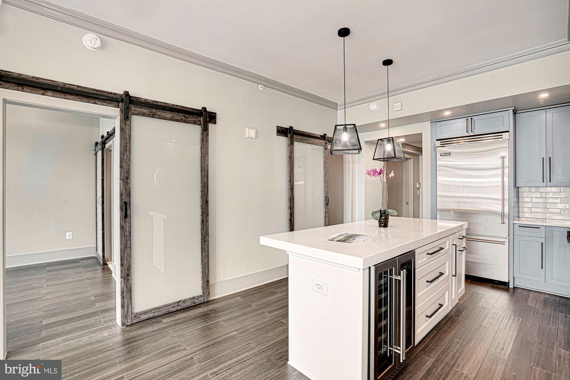 4301 Military Road Northwest, Unit 611 Washington, DC 20015 - Photo 7 of 45 Kitchen with center island