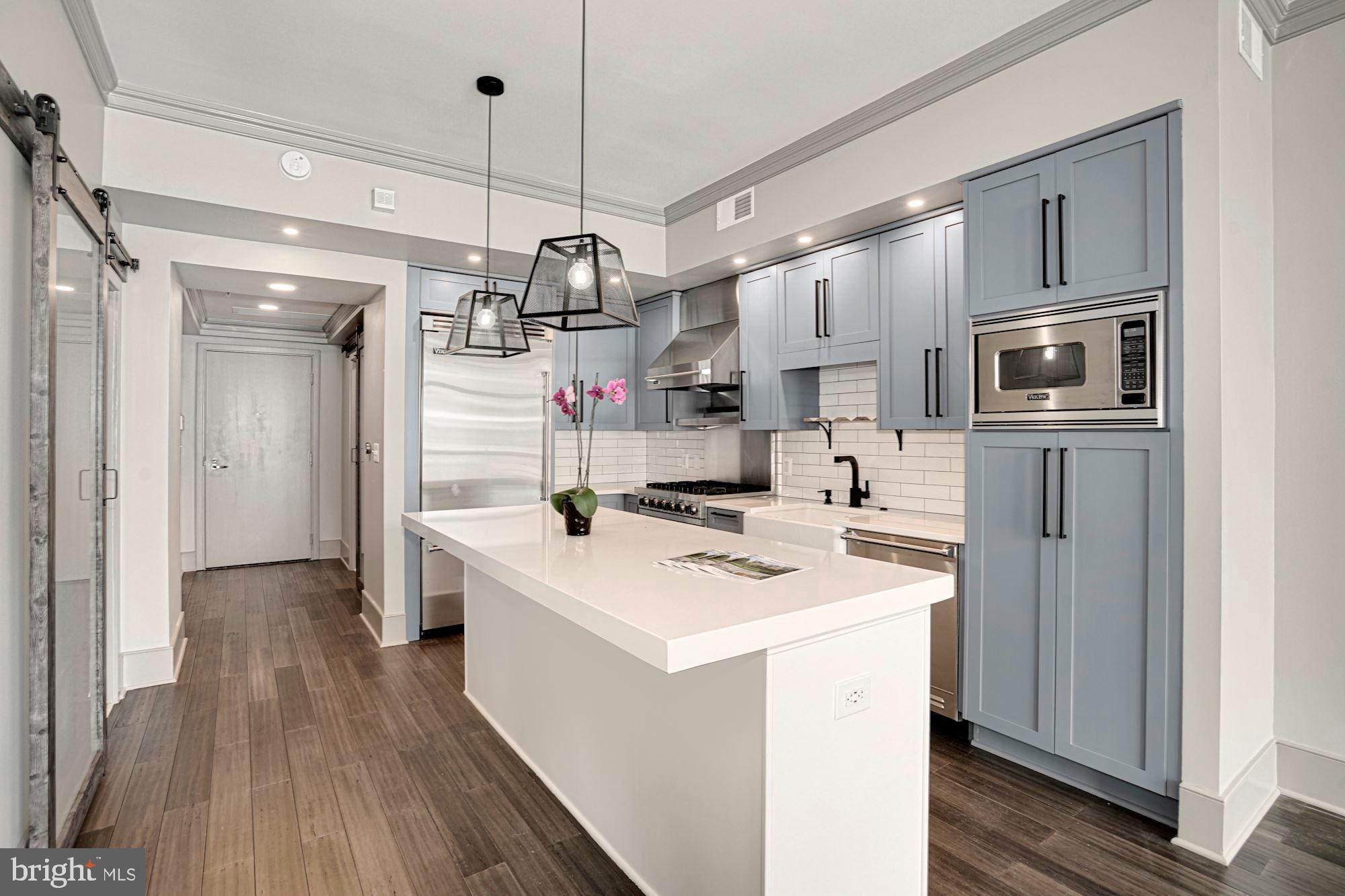 4301 Military Road Northwest, Unit 611 Washington, DC 20015 - Photo 8 of 45 Kitchen with center island