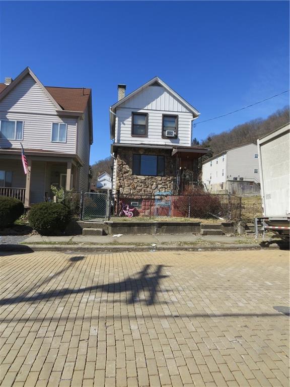 806 9th Street McKees Rocks, PA 15136 - Photo 1 of 1 a front view of a house with swimming pool
