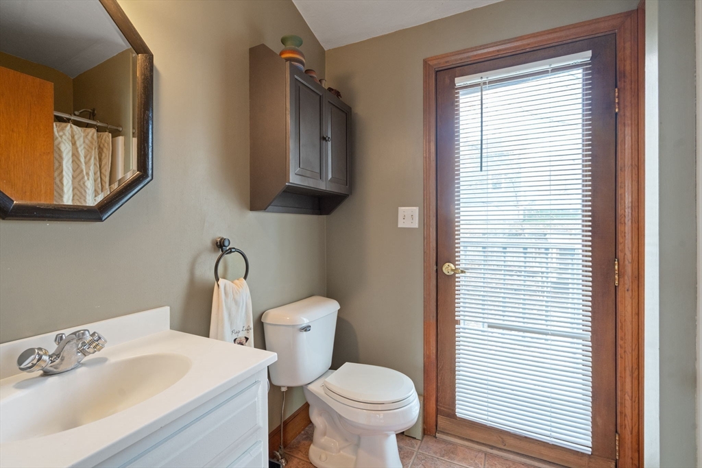 37 Glendale Street Maynard, MA 01754 - Photo 20 of 33 a white toilet sitting next to a bathroom sink