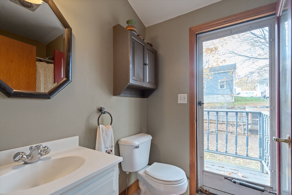 37 Glendale Street Maynard, MA 01754 - Photo 22 of 33 a bathroom with a toilet a sink and a mirror