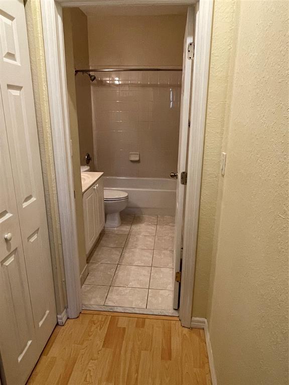 3389 Merrick Court, Unit 3389 Pompano Beach, FL 33063 - Photo 13 of 23 a bathroom with a tub shower vanity and a sink