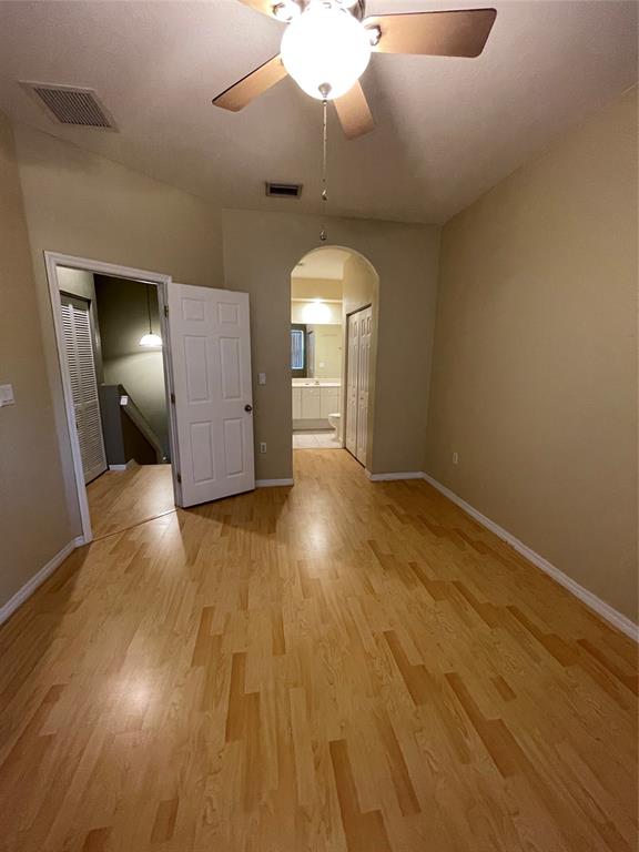 3389 Merrick Court, Unit 3389 Pompano Beach, FL 33063 - Photo 10 of 23 a view of a room with wooden floor