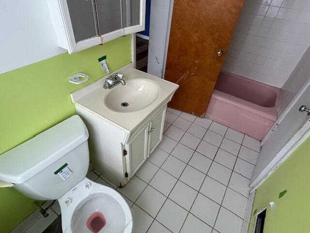 17946 Roy Street Lansing, IL 60438 - Photo 9 of 17 a bathroom with a sink and a toilet