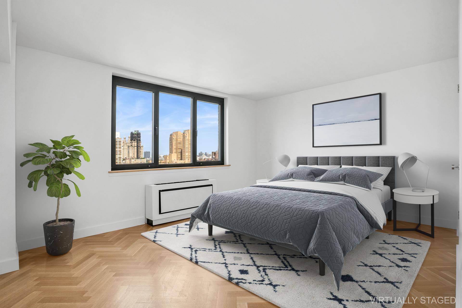 45 West 67th Street, Unit 25F Manhattan, NY 10023 - Photo 4 of 9 a bedroom with a bed and painting on the wall