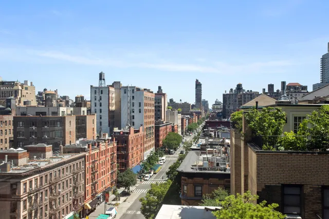 a view of a city with tall buildings