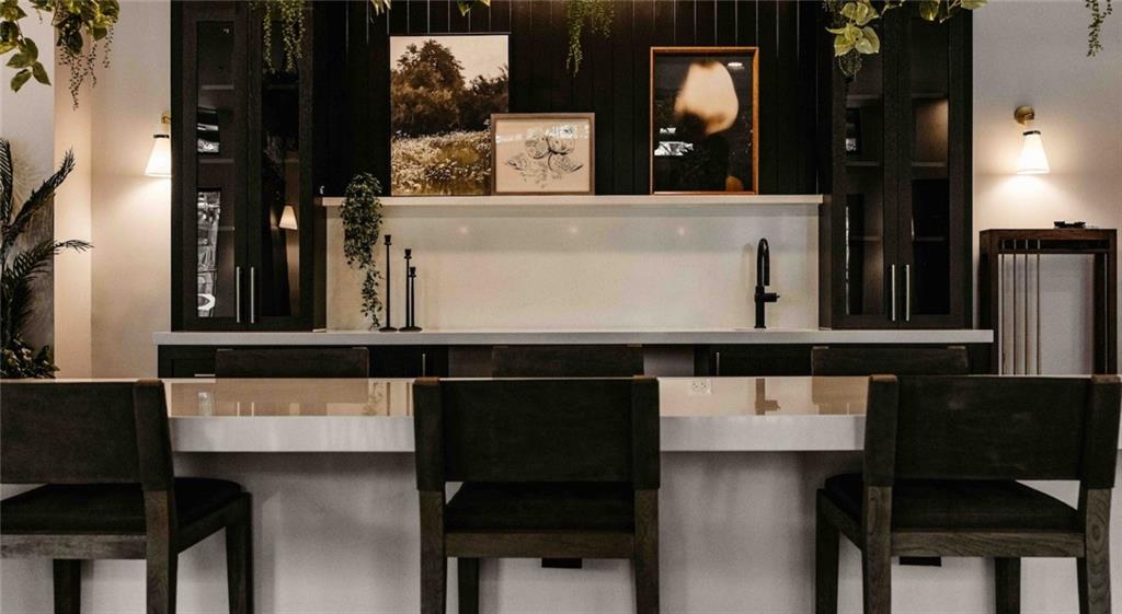 2490 North Druid Hills Road Atlanta, GA 30329 - Photo 11 of 18 a view of a living room with a table and chairs