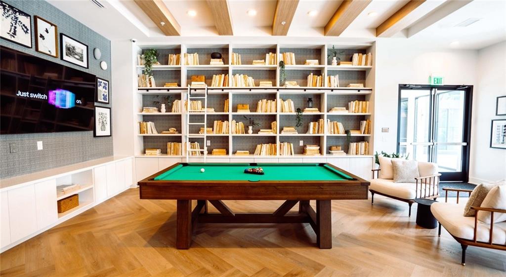 2490 North Druid Hills Road Atlanta, GA 30329 - Photo 16 of 18 a living room with furniture and a flat screen tv