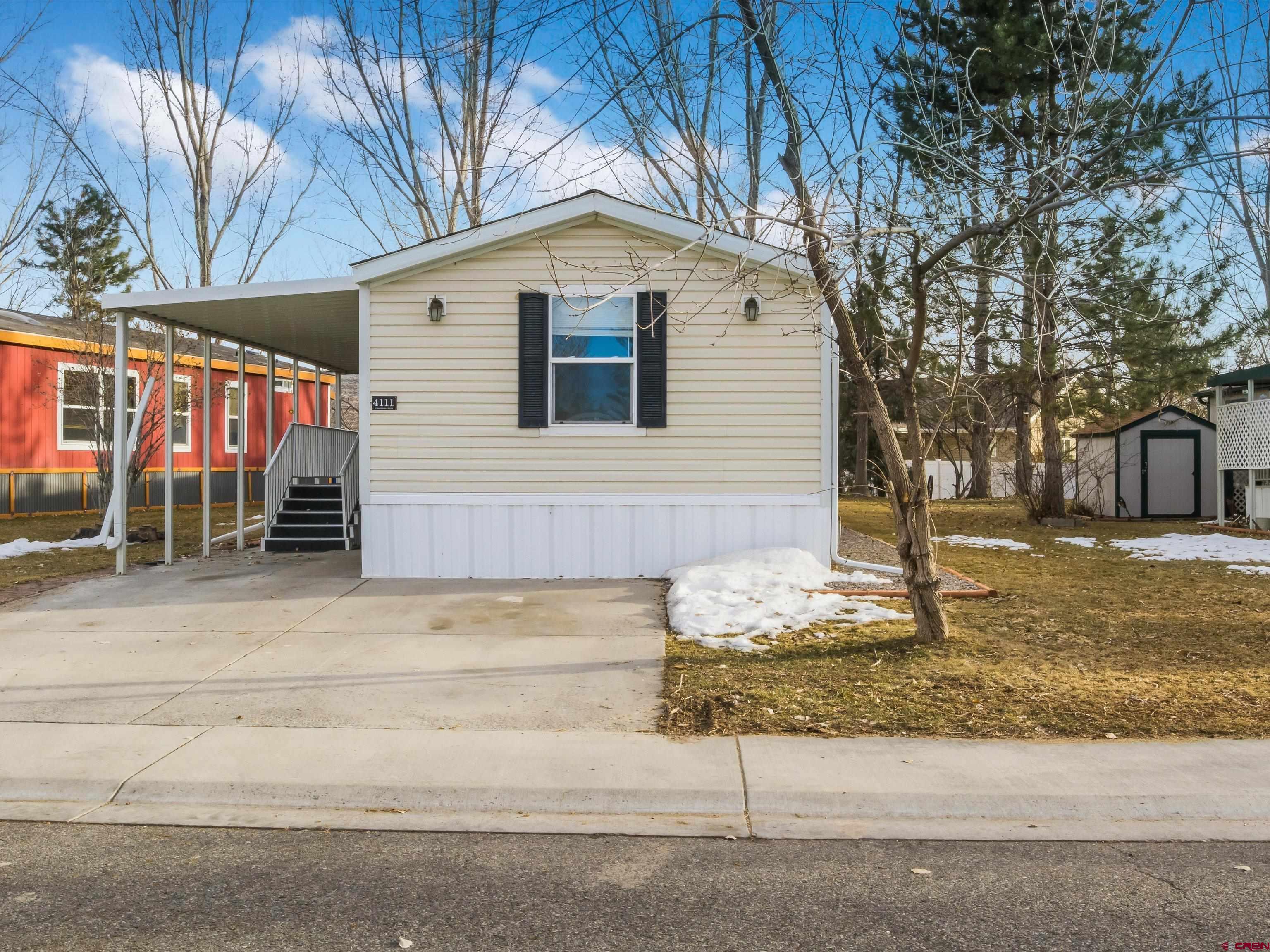 a front view of a house with garage