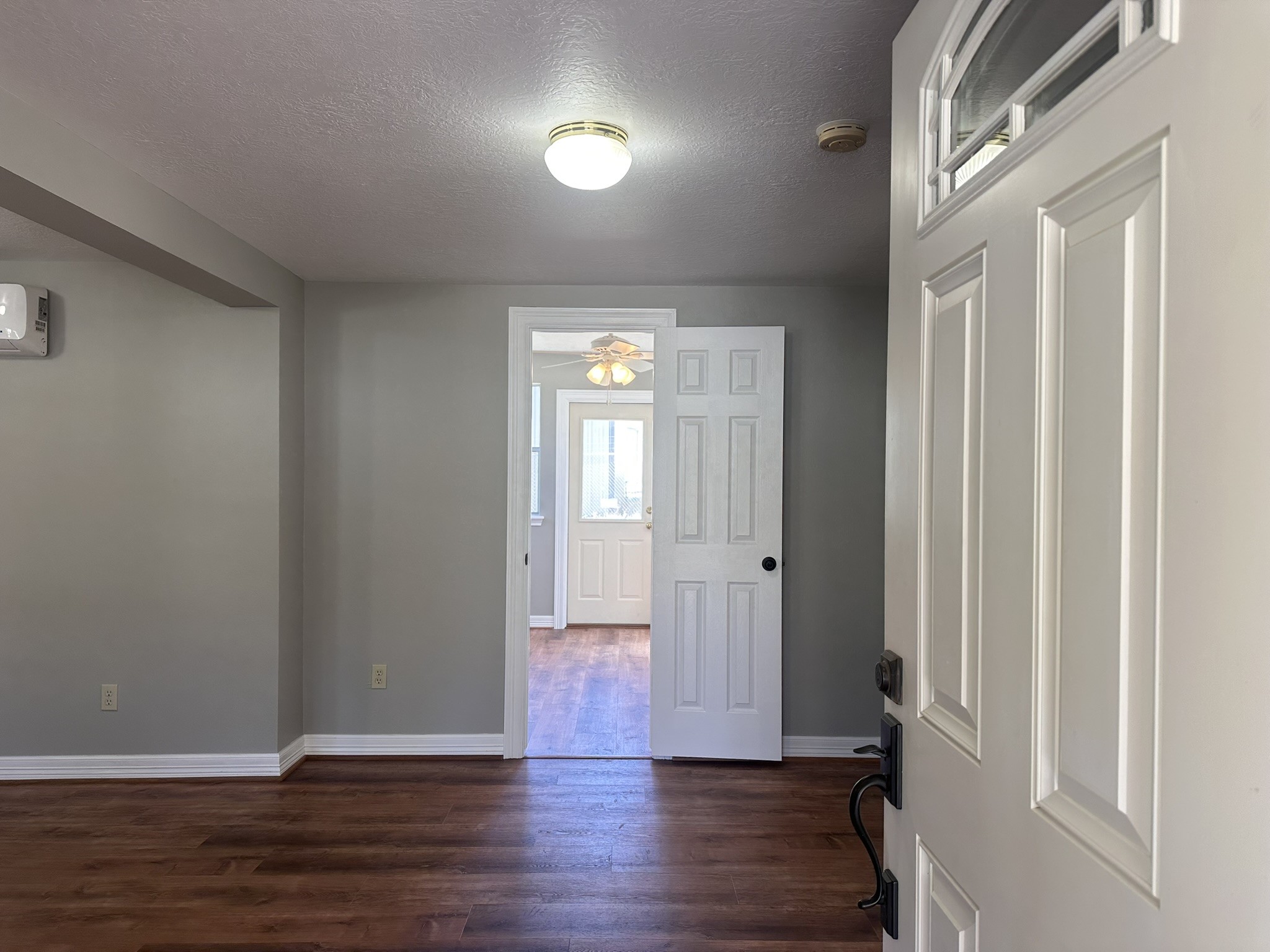 13868 Cedar Hill Road Montgomery, TX 77356 - Photo 11 of 19 a view of an empty room with wooden floor and a window