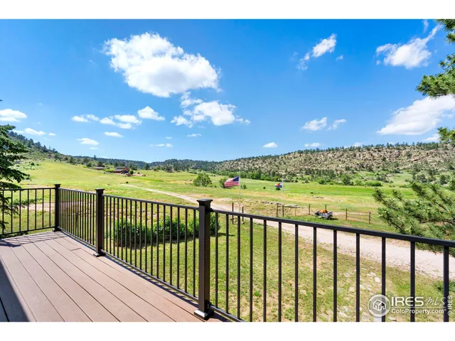 a view of balcony with furniture