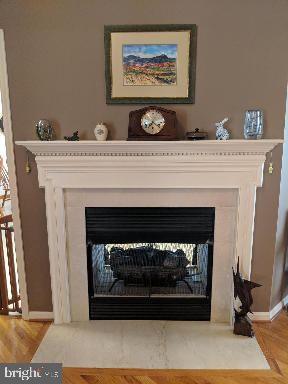 206 Ackerman Road Stevensville, MD 21666 - Photo 23 of 27 Two sided fireplace (living room side)