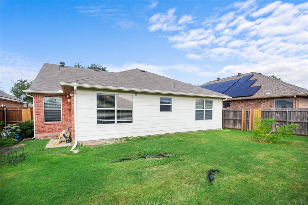 3041 Winding Meadow Trail Princeton, TX 75407 - Photo 19 of 20 a front view of a house with a garden