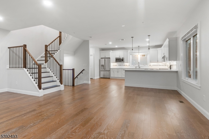 22 Arcadia Place Union, NJ 07088 - Photo 1 of 33 a view of kitchen with wooden floor and electronic appliances