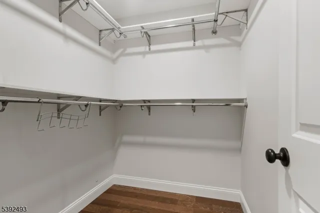 a view of a room with racks on the wall