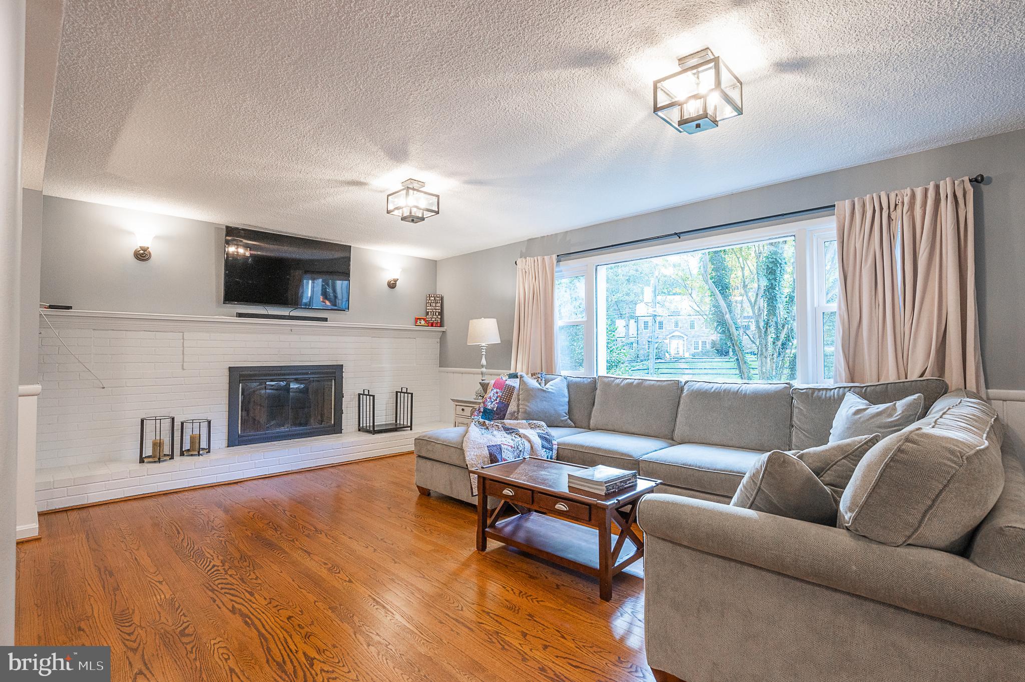 3675 Military Road Arlington, VA 22207 - Photo 23 of 40 Lower Level Recreation Room with Hardwood Floors