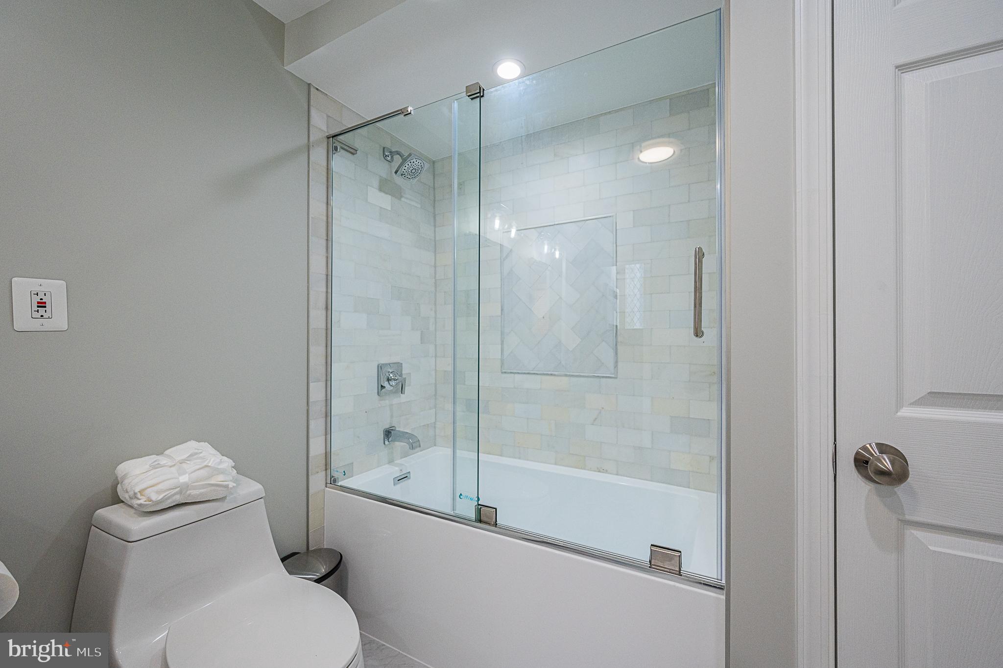 3675 Military Road Arlington, VA 22207 - Photo 31 of 40 Beautiful Marble Style Subway Tile & Glass Doors