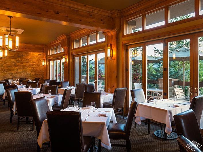 141 Scott Hill Road, Unit 402 Beaver Creek, CO 81620 - Photo 23 of 23 a view of a dining room with furniture window and outside view