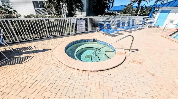 a view of a terrace with furniture