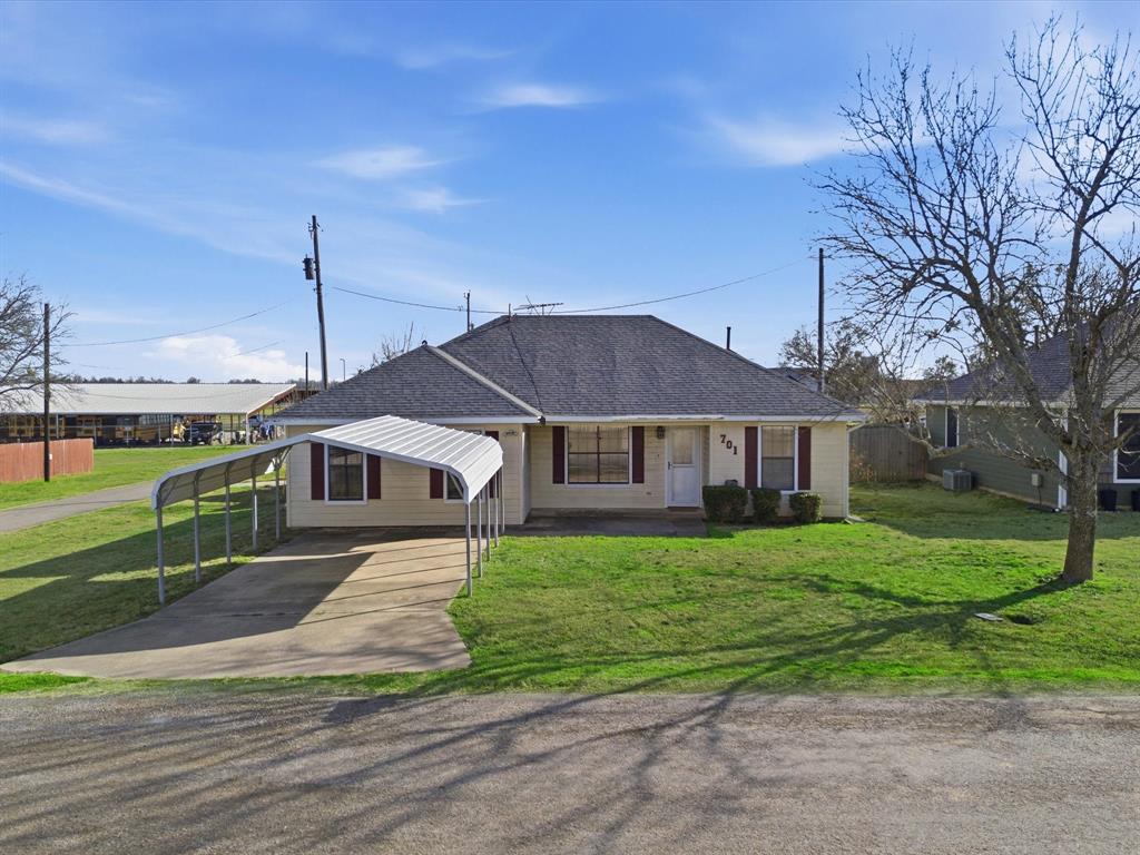 701 College Street Celeste, TX 75423 - Photo 1 of 29 a front view of a house with a yard