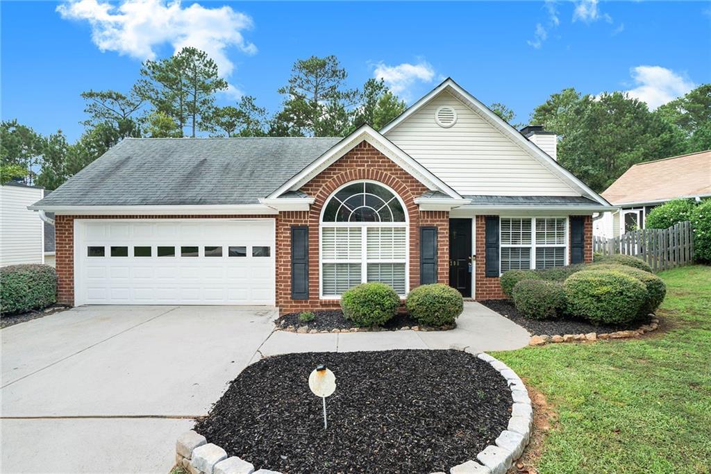 208 Pine Ridge Trace Athens, GA 30605 - Photo 1 of 1 a front view of a house with a yard