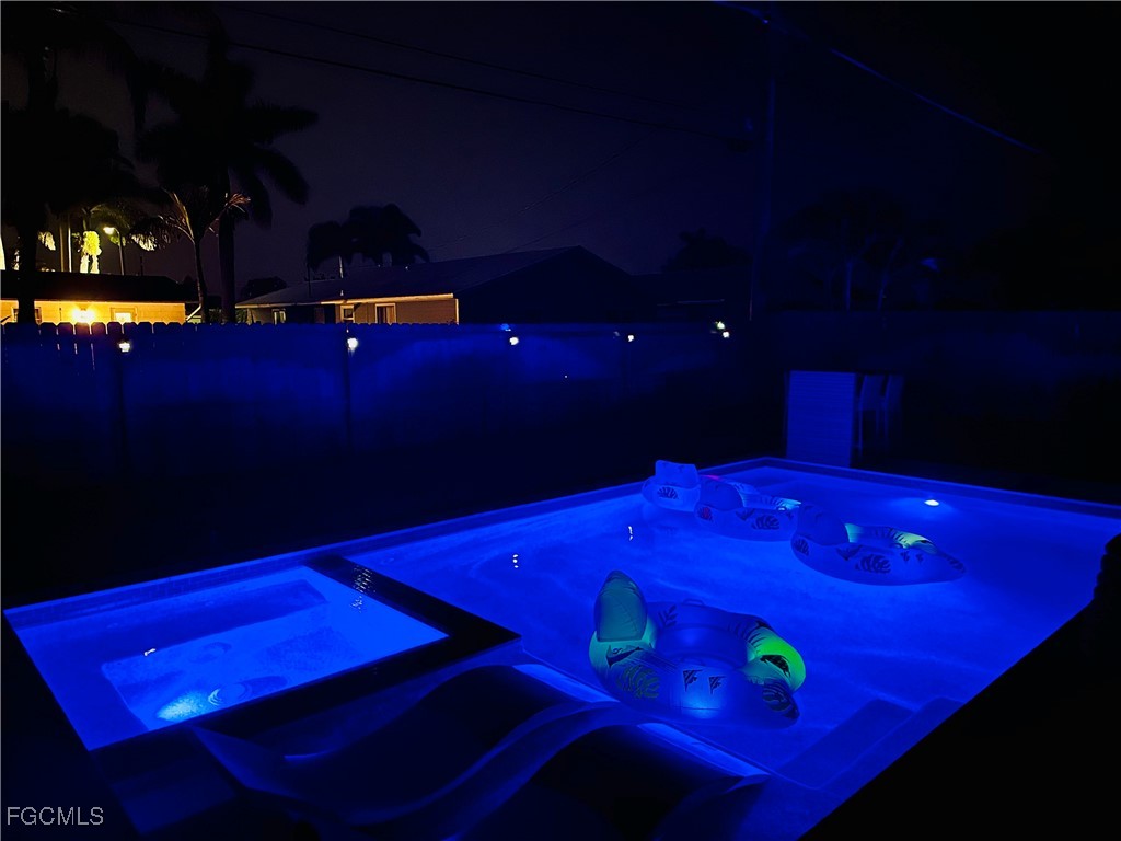 754 105th Avenue North Naples, FL 34108 - Photo 24 of 32 a view of a red car with sitting space