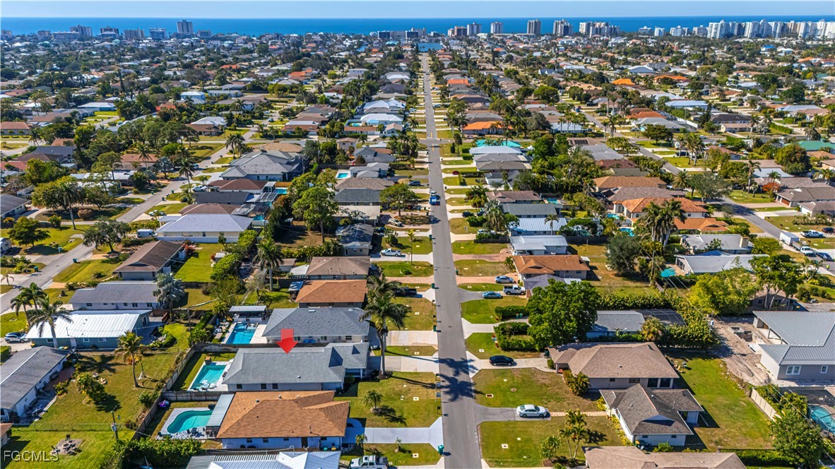 754 105th Avenue North Naples, FL 34108 - Photo 27 of 32 an aerial view of residential houses with outdoor space
