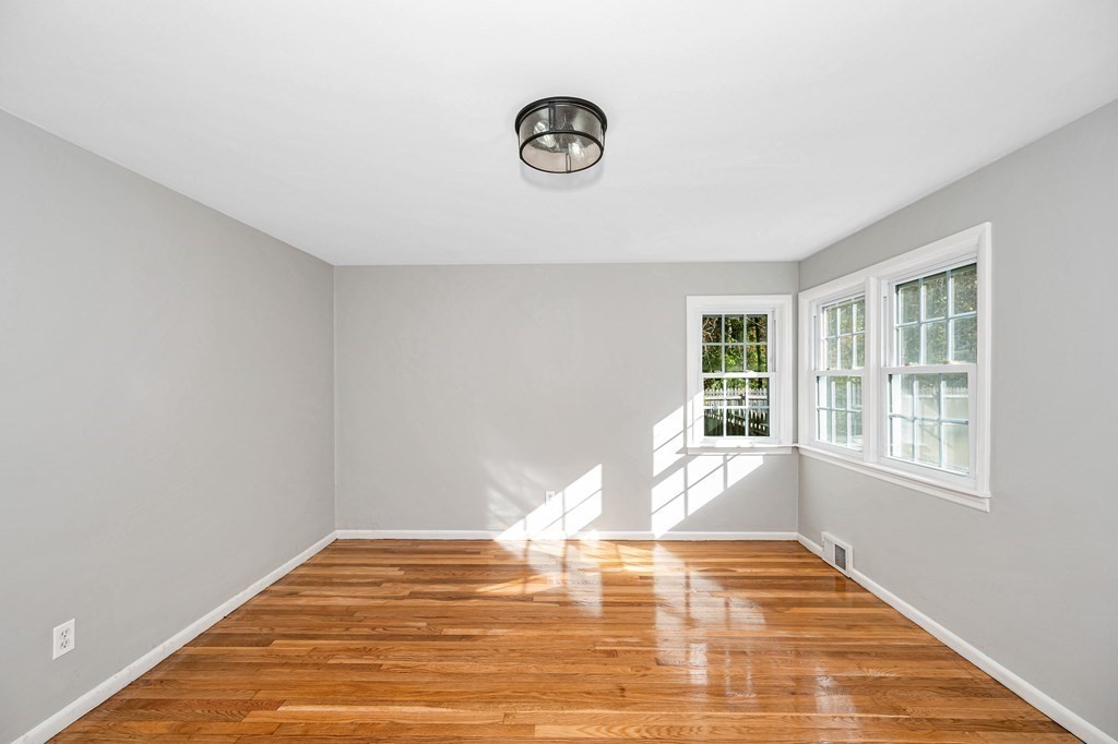 26 Ledge Road Chelmsford, MA 01863 - Photo 12 of 33 a view of an empty room with a window