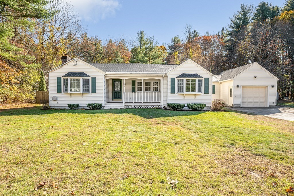 26 Ledge Road Chelmsford, MA 01863 - Photo 25 of 33 a front view of a house with a yard and swimming pool