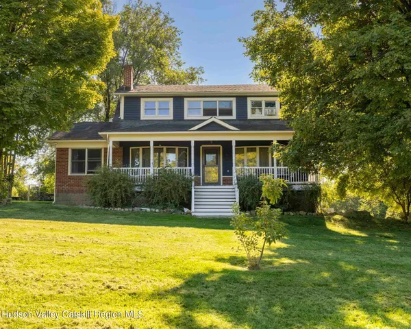 a view of a house with a swimming pool
