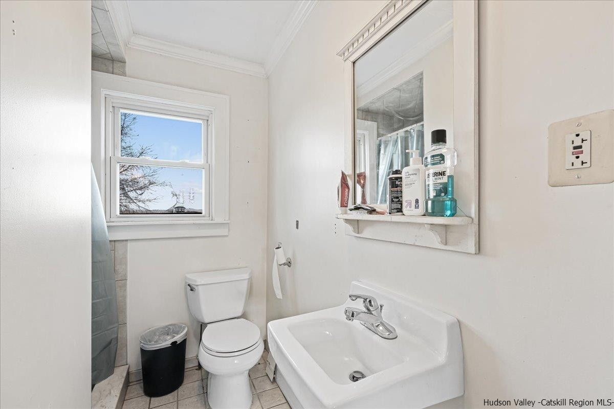 98 North Road Highland, NY 12528 - Photo 21 of 33 a bathroom with a toilet a sink and mirror